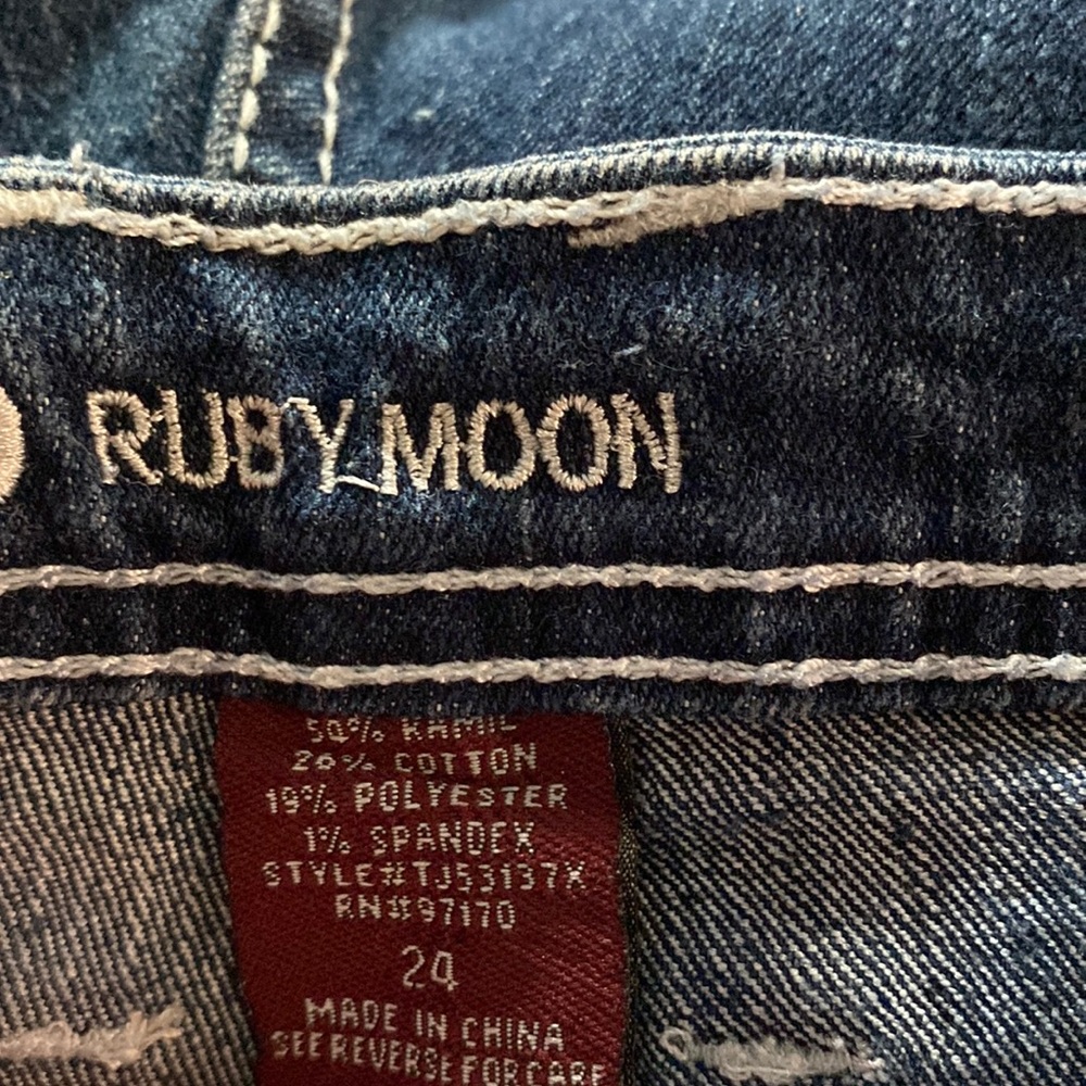 Very gently used blue jeans